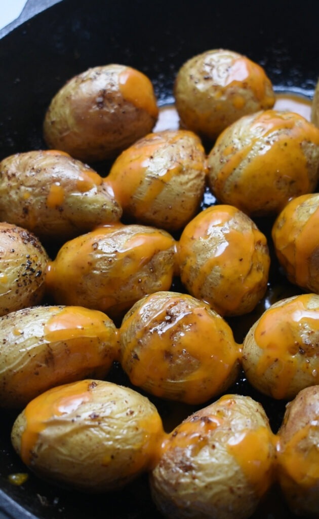 adding buffalo sauce