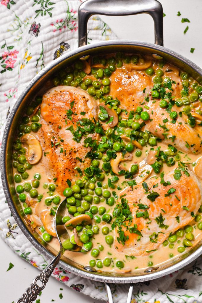 pot of creamy chicken with mushroom and peas