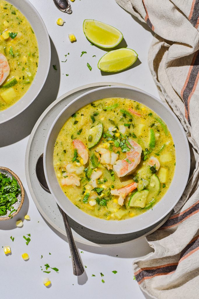 bowl of shrimp zucchini corn chowder topped with fresh cliantro