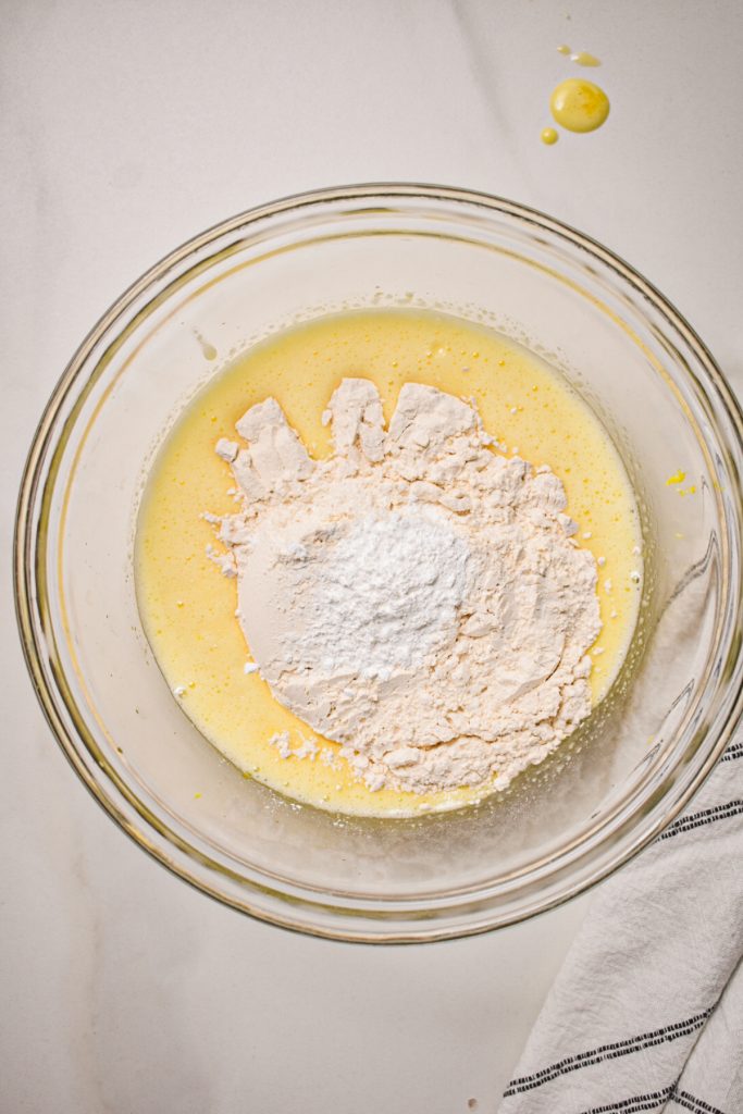 Flour added into the mixing bowl.