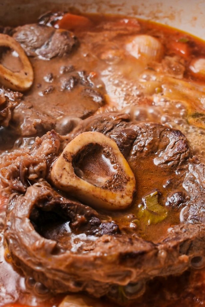 Spring stew osso bucco simmering in the dutch oven.