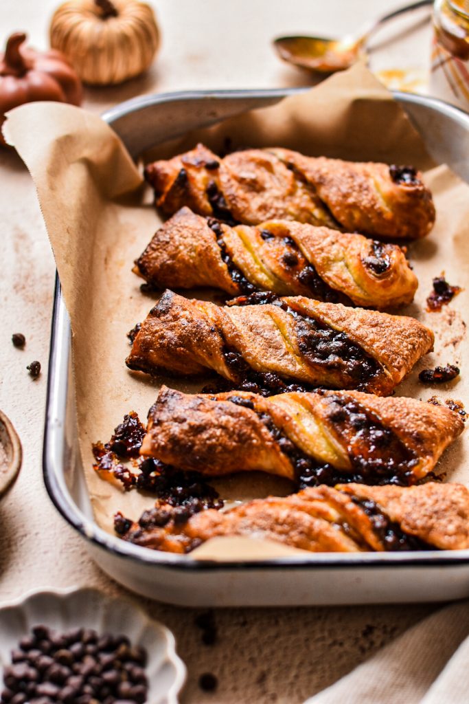Side view of pumpkin butter and chocolate chip twists after being baked.