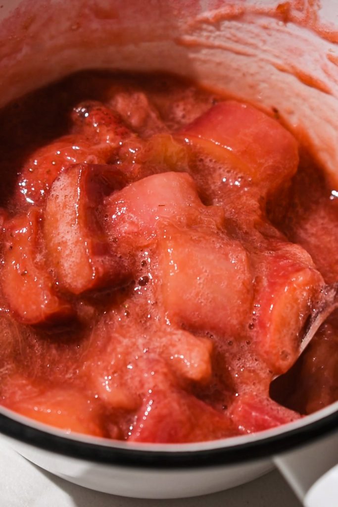 Rhubarb compote in a saucepan after it is cooked down.