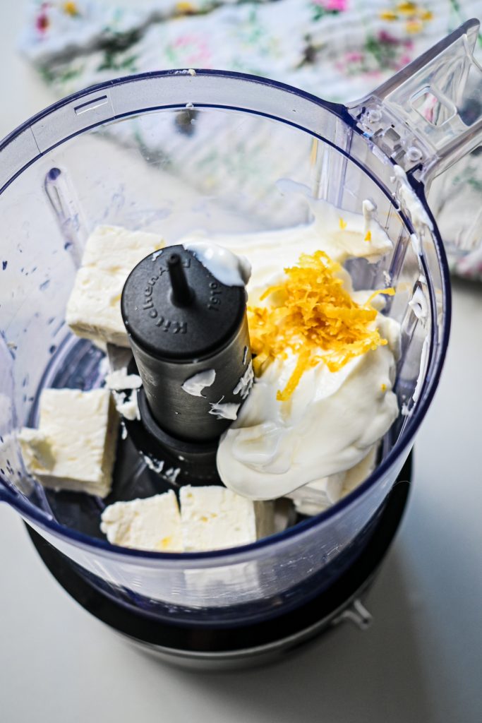 Feta, yogurt and lemon zest in a food processor.