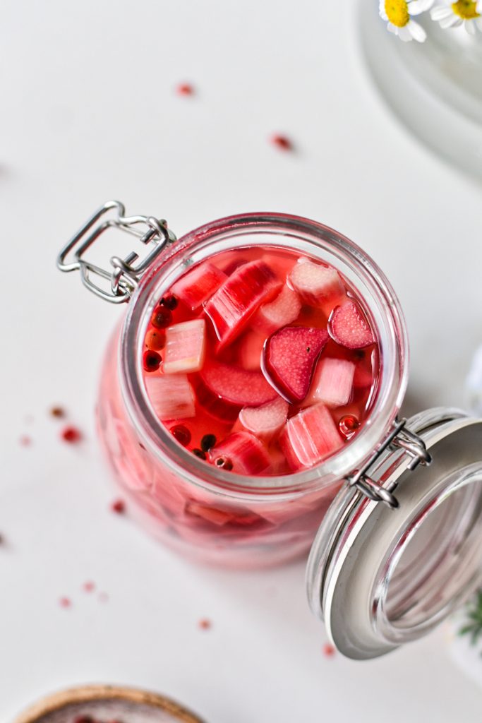 Overhead shot of easy pickled rhubarb in an open jar.