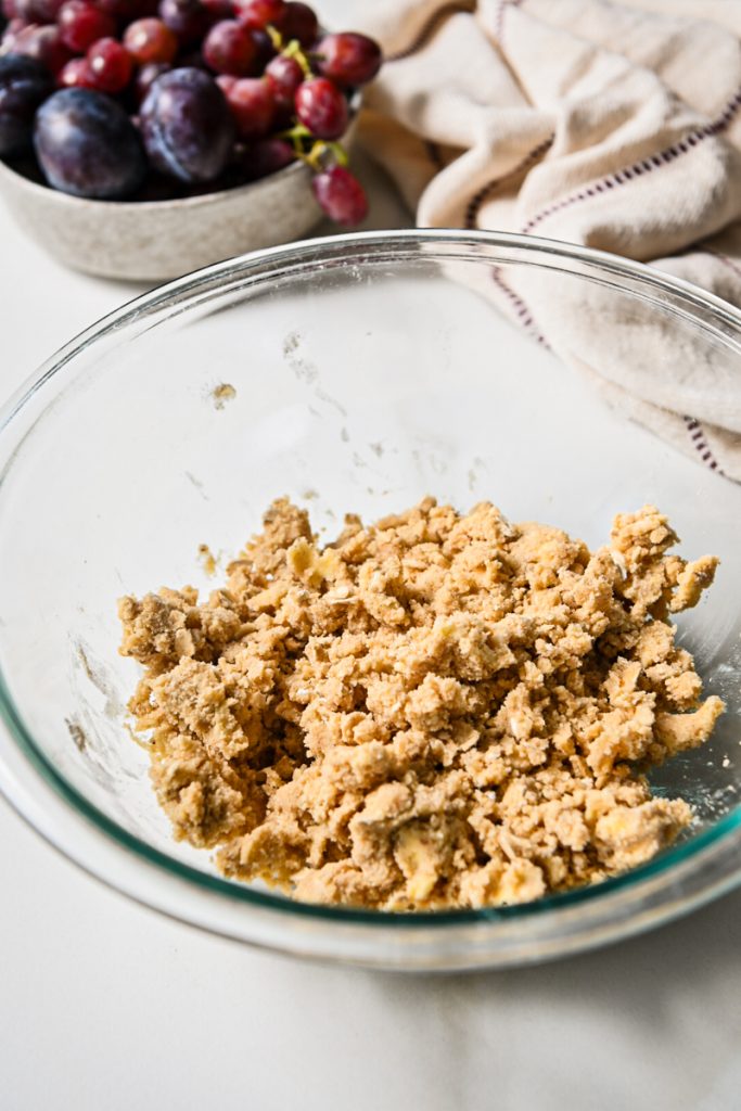 Crisp topping mixture all mixed together in a mixing bowl.