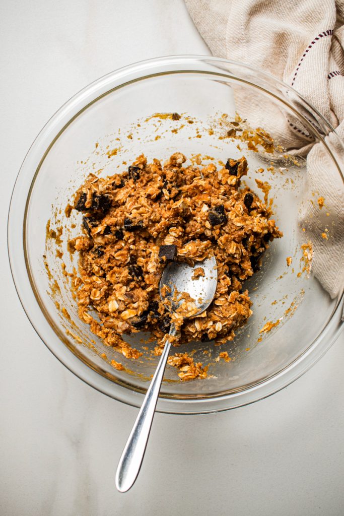 Pumpkin chocolate oats mixed up in a mixing bowl.