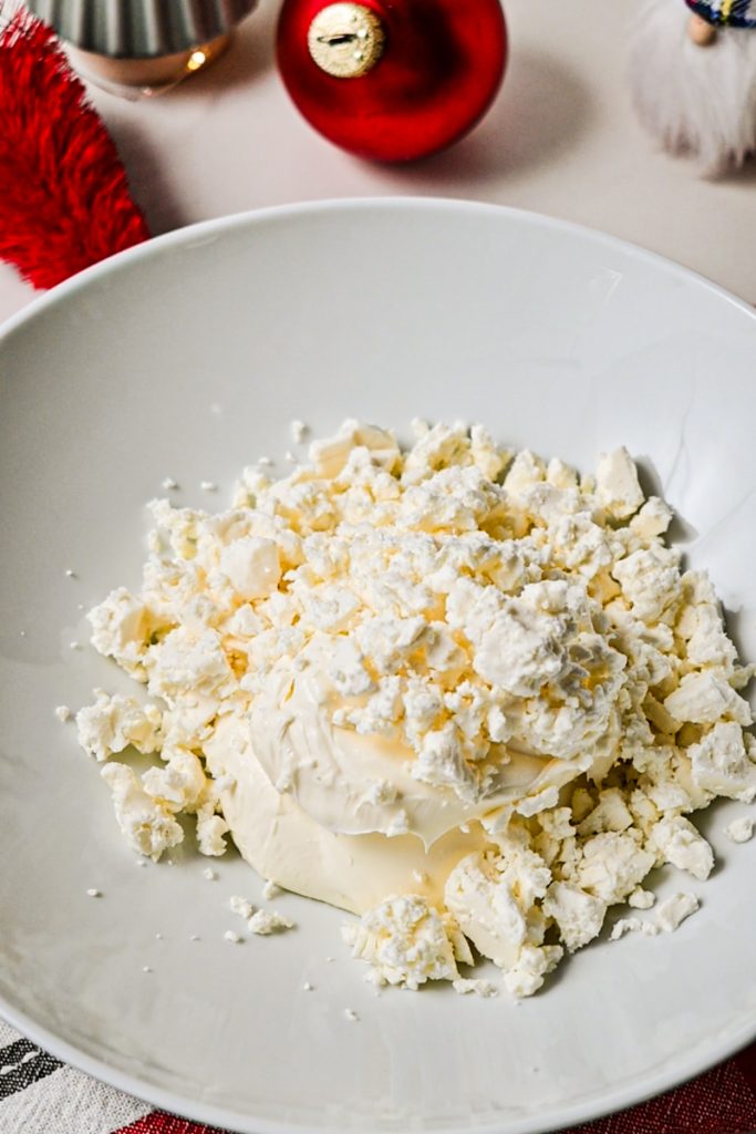 Cream cheese and feta cheese in a bowl.